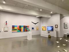 Installion view of a Richard Bell painting with others at Newlyn Art Gallery and The Exchange in Penzance